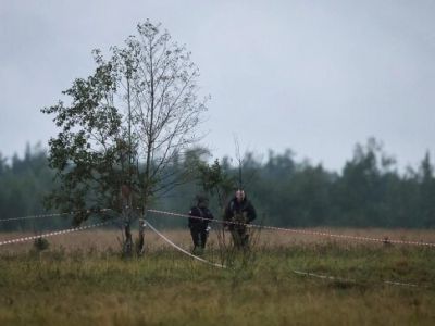 Оперативные службы на месте крушения самолета. Фото: Марина Лысцева / Reuters